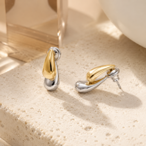 Dual tone pear drop studs