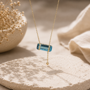 Aquamarine tie over necklace