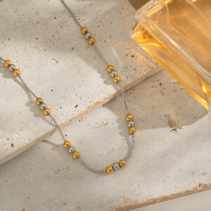 Dual tone interval ball necklace